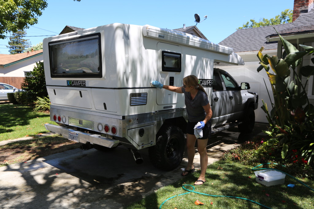 Erica gives the XPCamper a bath!  With the top down, the camper has a pretty low profile.
