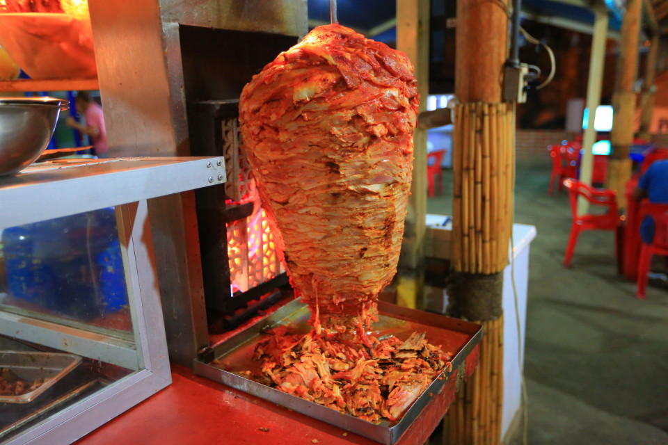 Tacos al pastor. Roasted pork with a slice of BBQ pineapple. The best!