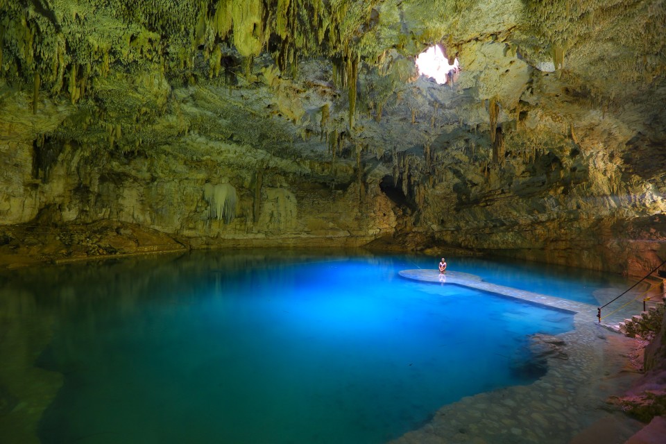 We were alone in the cenote for about 45 minutes, when suddenly this loud Mayan chanting music started. We were trying to figure out what the heck was going on when we saw a bus load of tourists enter. I guess the solo travelers don't get Mayan mood music (thank god!).