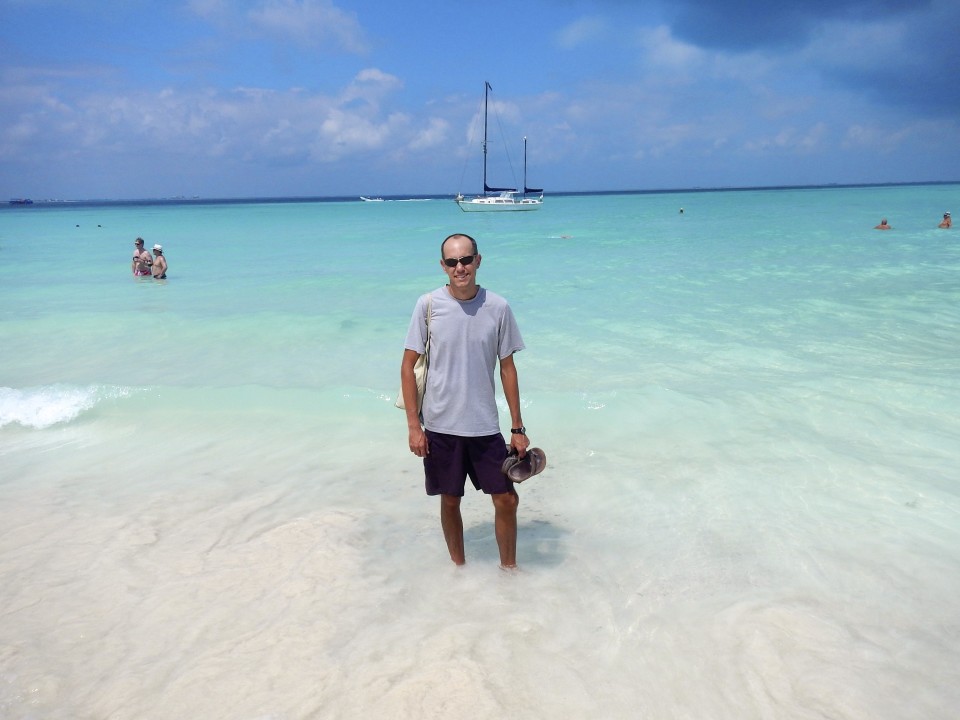 Sam on the stunning white sand beach. The water was just unreal looking.