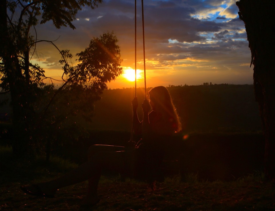 Watching the sunsets from a swing. Never gets old.