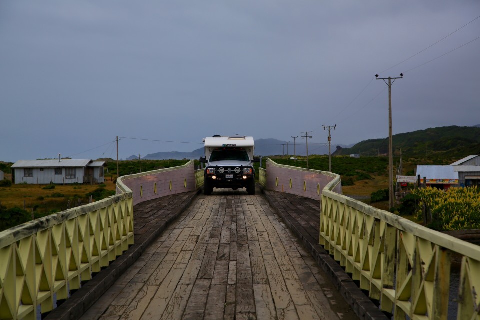 There was a bridge near where we camped that looked like a boat from the side, this is Sam crossing it.